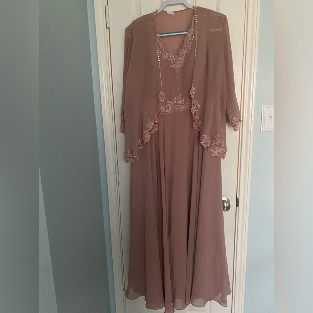 Rose color , with lace and sparkles on bodice waist line and jacket